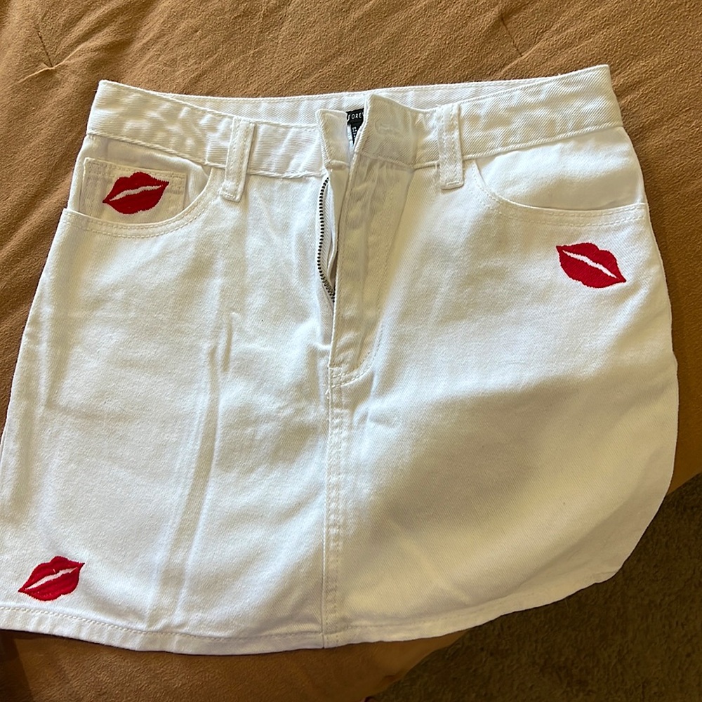 Forever 21 white skirt with red kisses. Perfect condition. Worn one time.